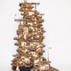 Illustration for article titled Artist transforms bonsai trees and empty cans into insane Lilliputian cities